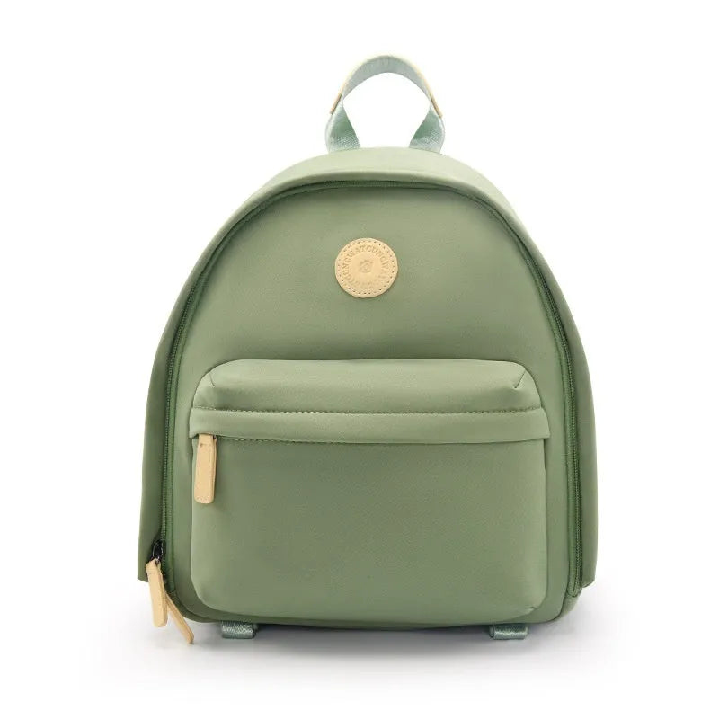 Solid colour shoulder camera bag for women with a detachable iPad compartment and a curve shoulder strap.