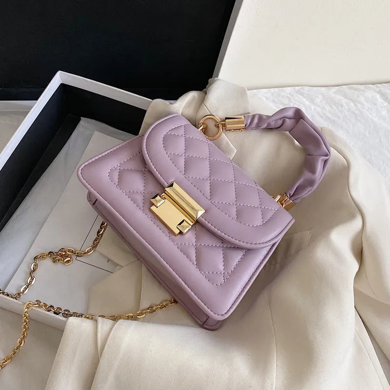 Korean style small square ladies crossbody bag in purple colour with soft PU surface
