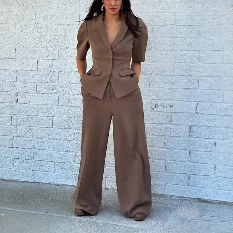 Brown men's two-piece slim fit suit with long sleeves and matching trousers on a hanger.