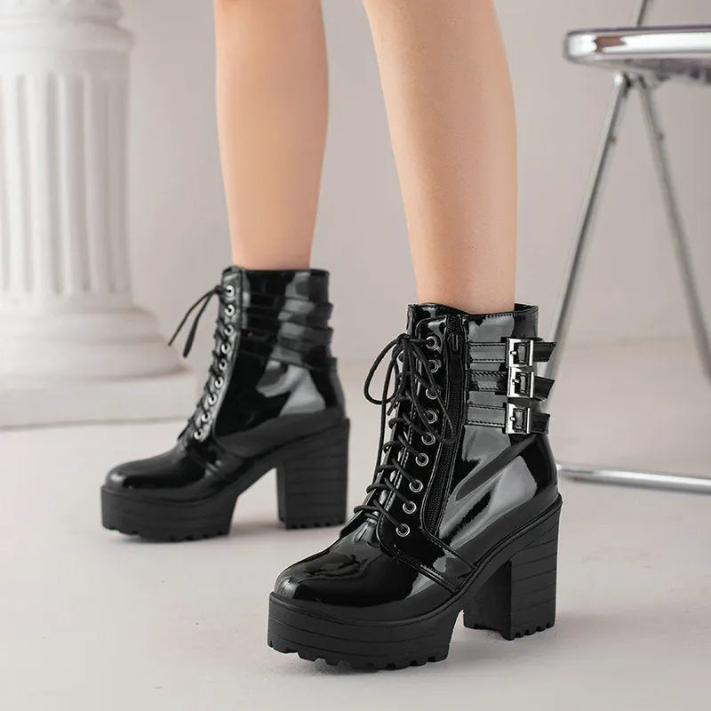 Women's black thick heel ankle boots with lace-up front and round toe on waterproof platform sole