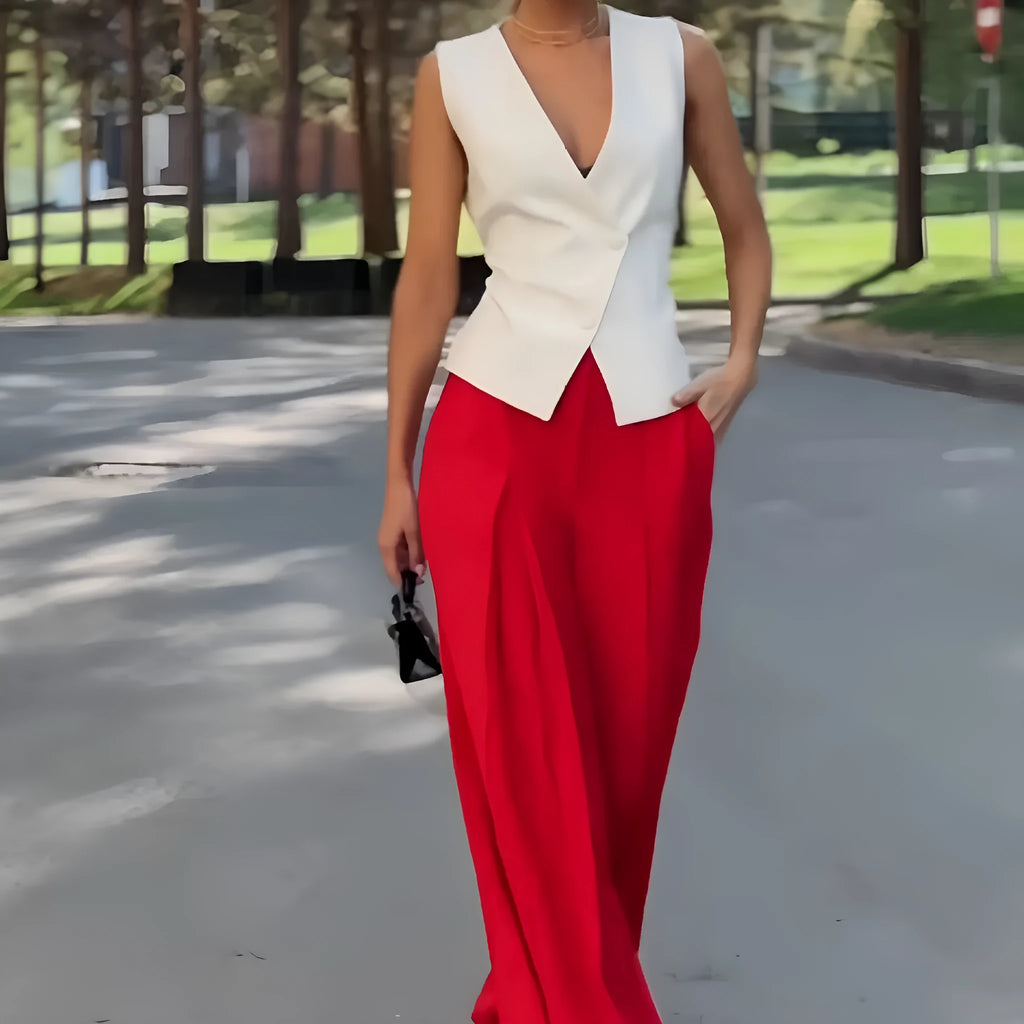 Women's beige polyester two-piece set showing sleeveless V-neck top with high-waist wide-leg trousers