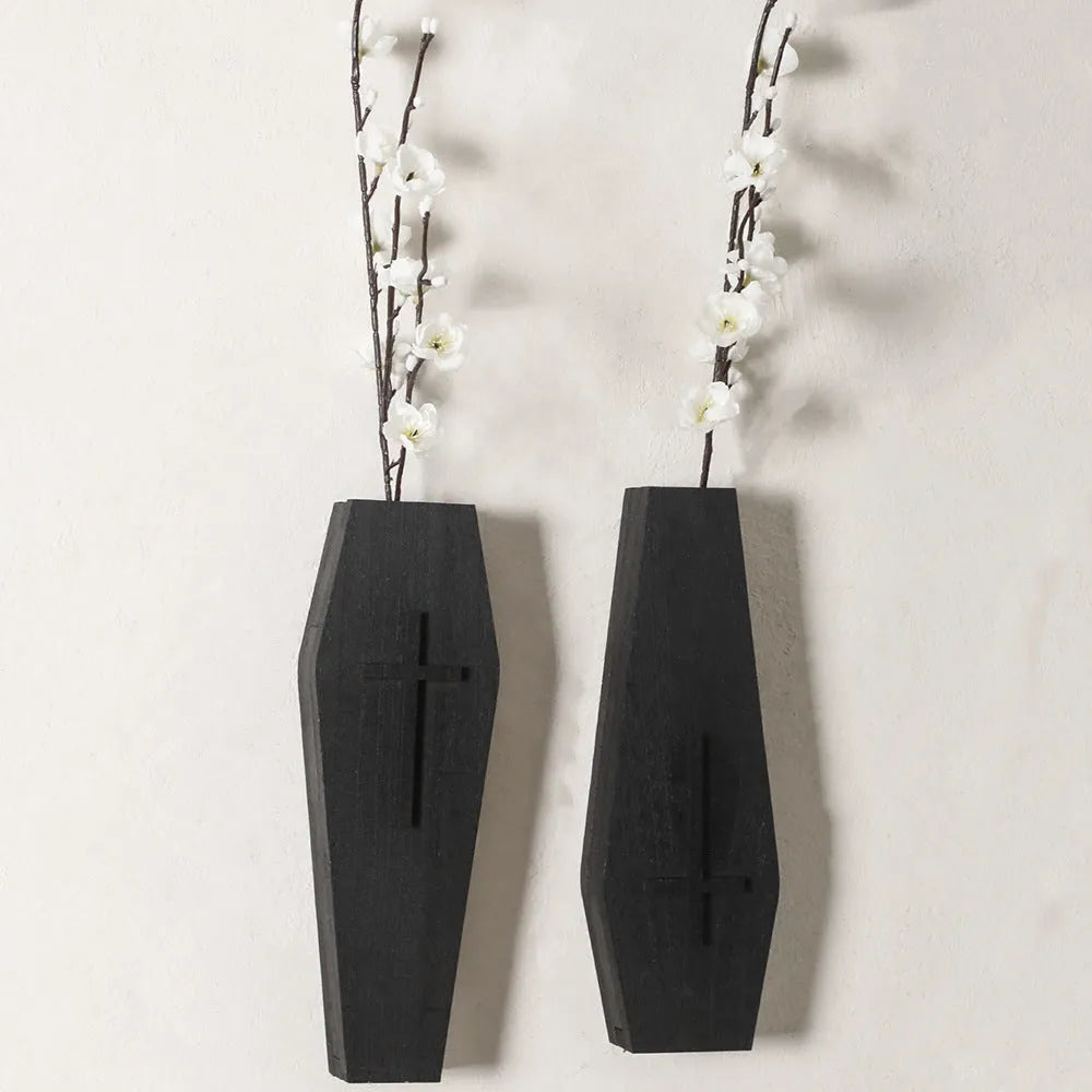 Wooden cross wall shelf decoration in black with integrated vase shelf measuring 27cm by 9cm