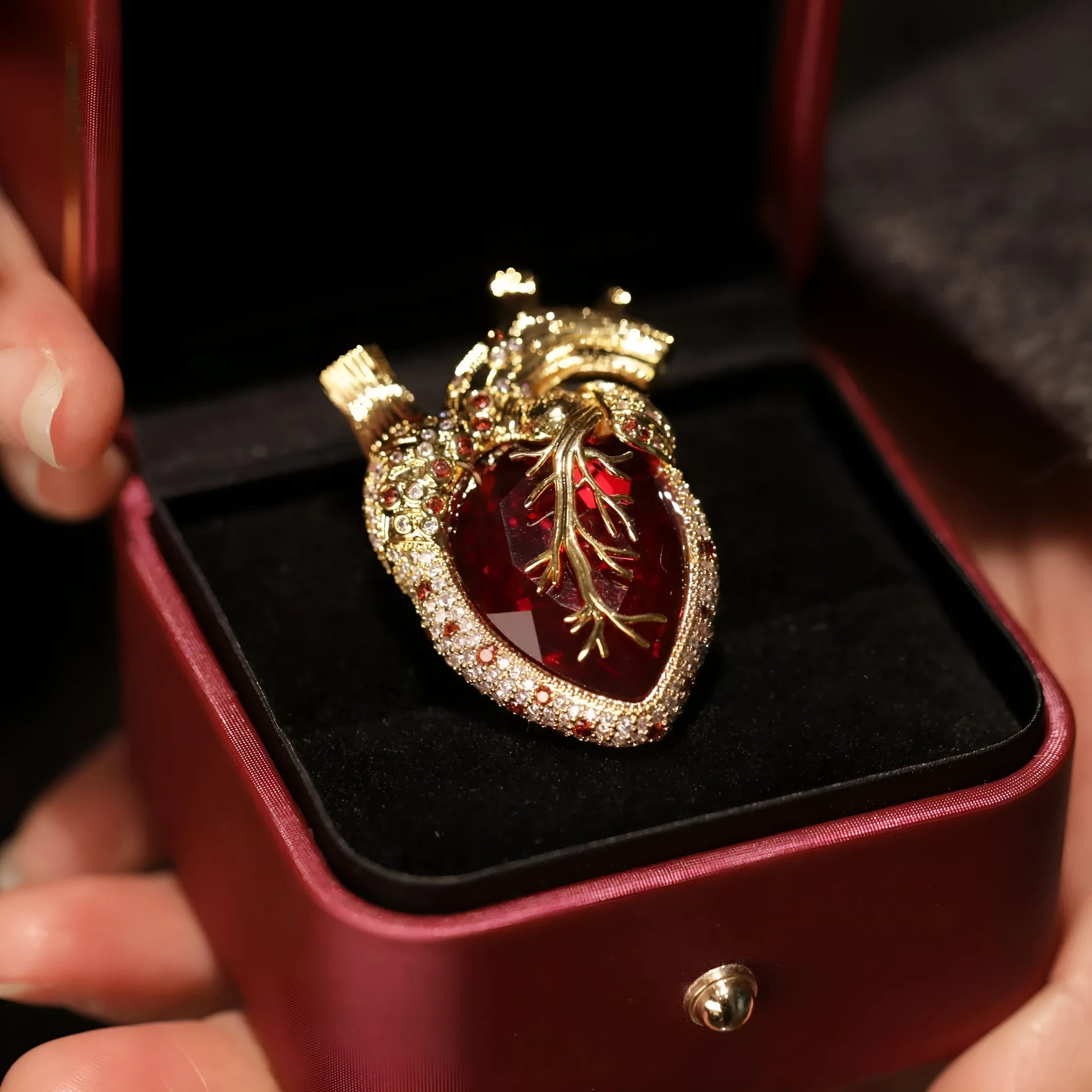 Copper zircon heart brooch with heavy industry style on a dark background