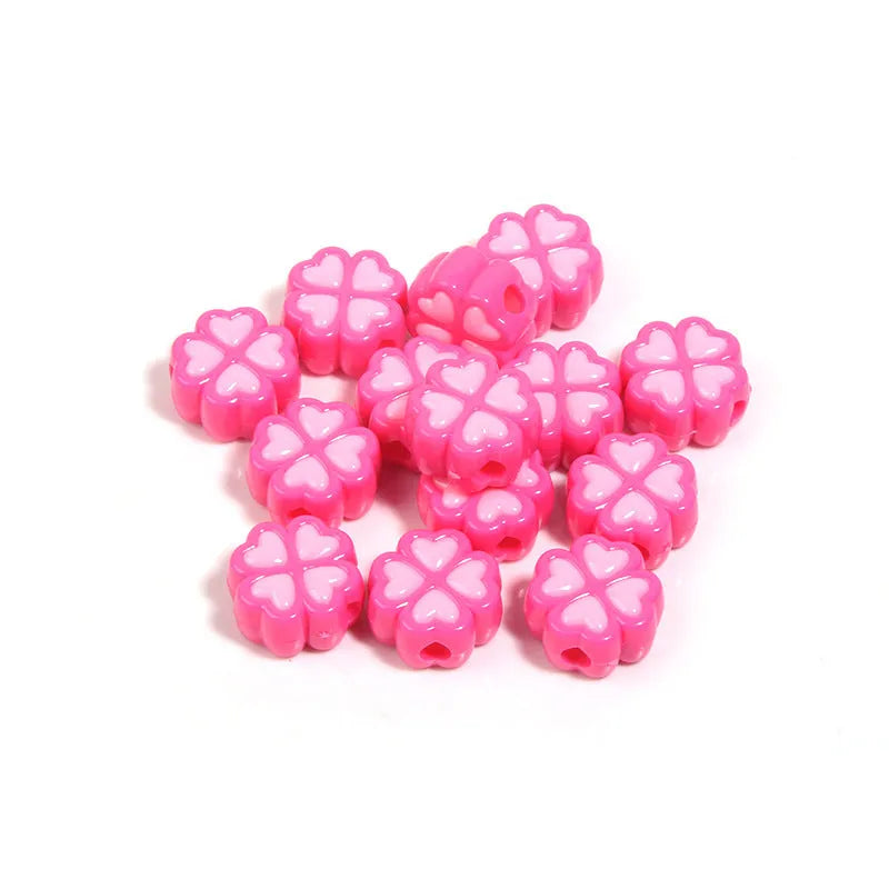 Assortment of 15mm frosted acrylic four-leaf clover beads in rose red, pink, yellow, green, blue, and purple colours.