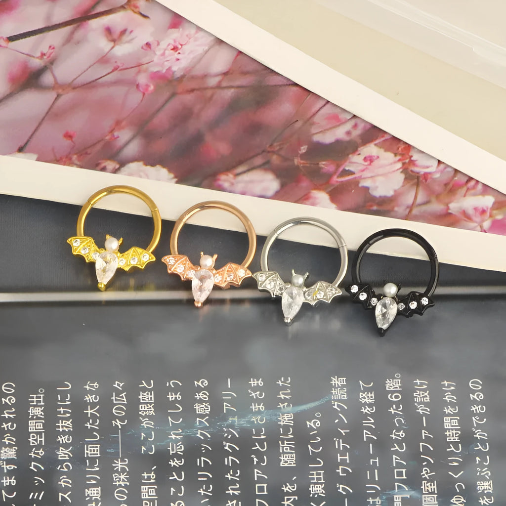 Closed-loop bat nose ring in stainless steel electroplated silver finish with star shape and moon elements