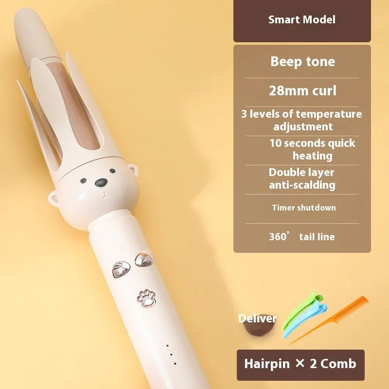 Beige anion automatic hair curler with wired power cord and included hair stick on a white background.