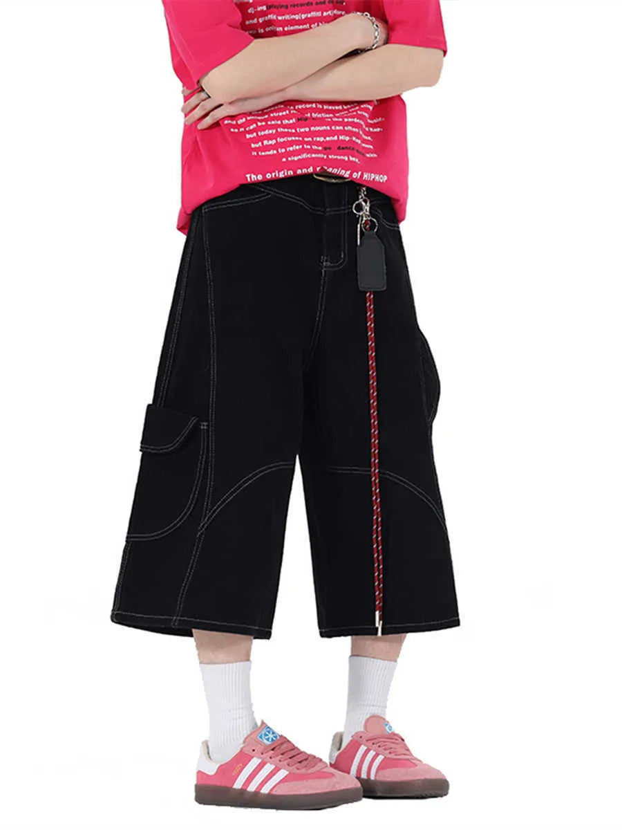 Black and red wide leg denim cropped pants with multiple pockets and mid waist