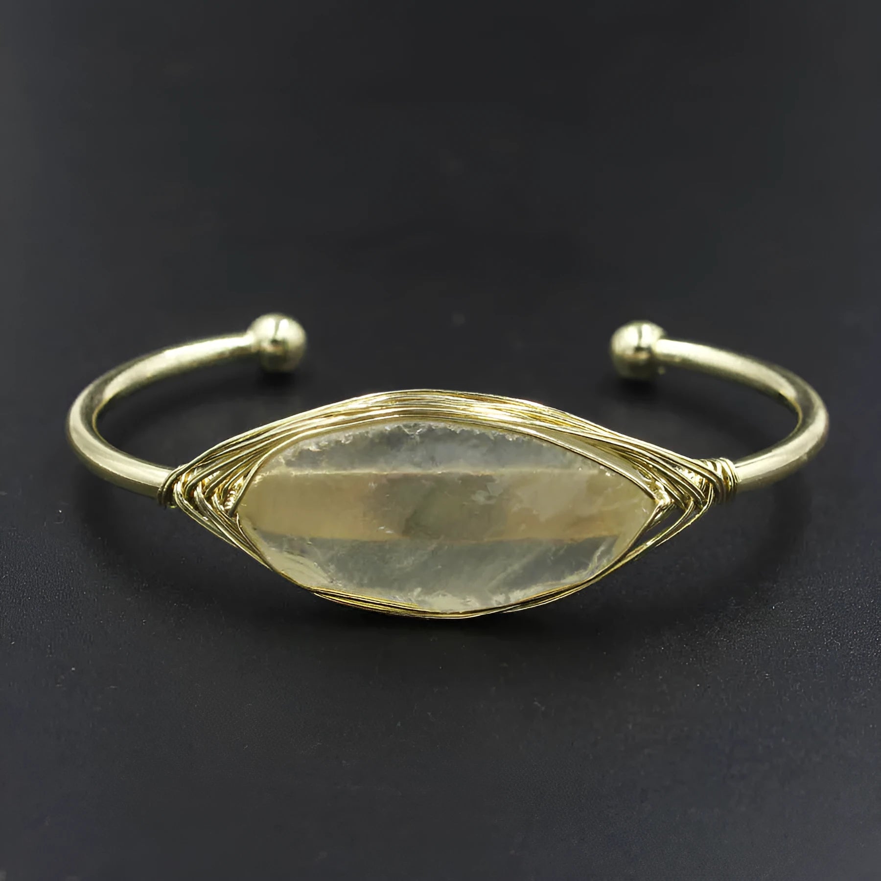 Natural raw gemstone crystal bracelet in ethnic style with simple opening, shown in one of nine colour options.