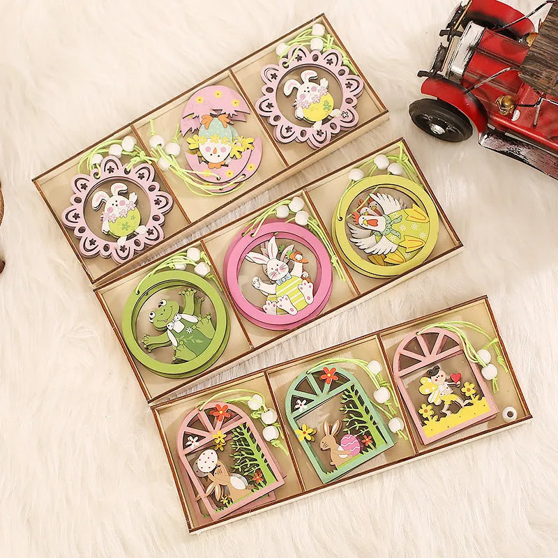 Set of 9 painted wooden Easter pendants with bunny, egg, and owl designs on a light background