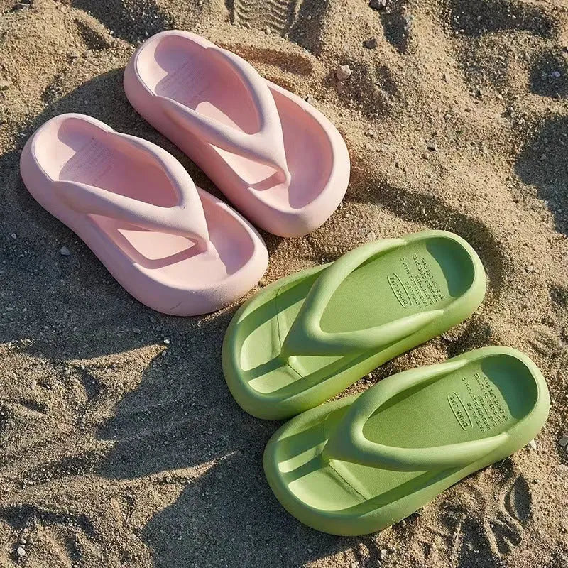 Solid colour thick-soled EVA flip-flops with decorative bow on strap.