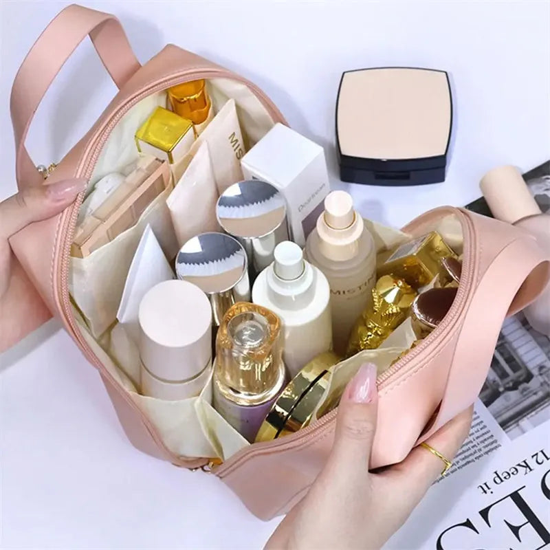 Shell shape PU leather waterproof cosmetic bag in milk apricot white with metal zipper