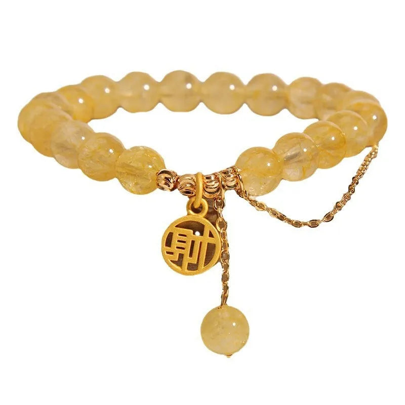 Natural citrine stone bracelet with an electroplated Chinese character tassel charm.