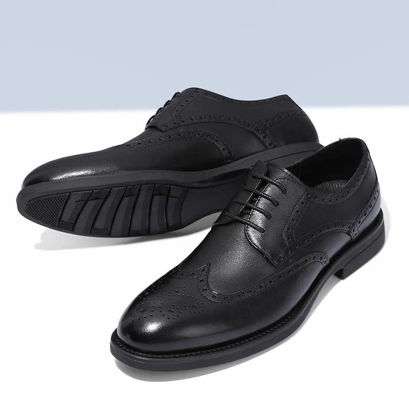 Men's black and brown brogue formal shoes with wingtip perforations, shown on a plain background.