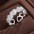 Geometric adjustable opening couples ring with heart design in gold or silver colour.