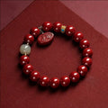 Natural cinnabar bracelet with Emperor sandstone Ping An Fu Lu design showing 8mm and 10mm bead size options.