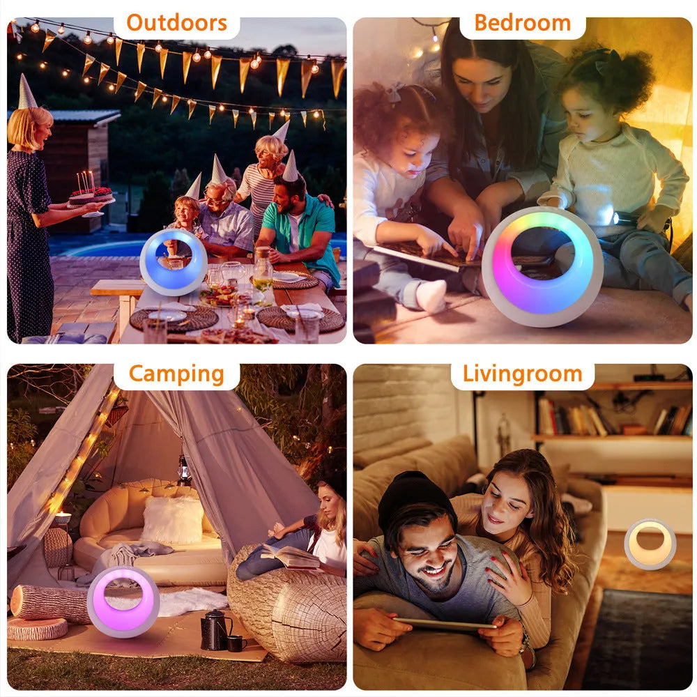 Creative Touch small white RGB colour changing night lamp with remote control on a wooden desk.