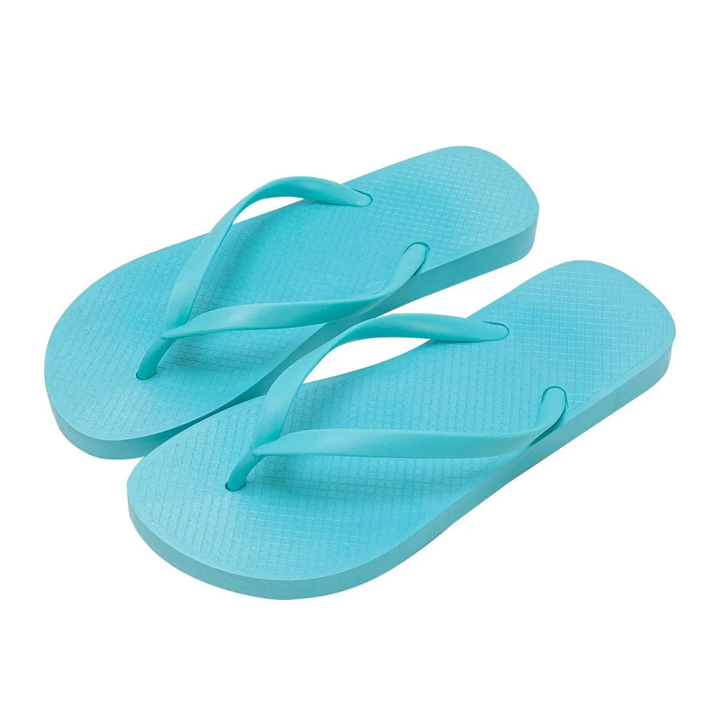 Foldable orange beach slippers showing hollow-out breathable design and non-slip PVC sole.