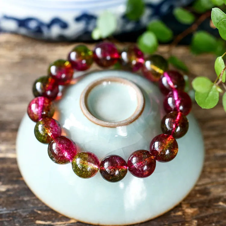 Handmade watermelon crystal bracelet in pastoral style shown in available sizes.