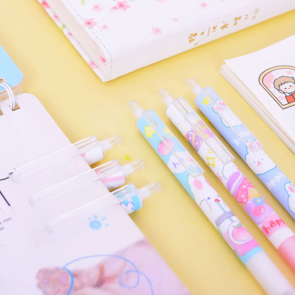 Six black gel pens with cartoon bunny designs, showing 0.5mm tips, arranged in a set.