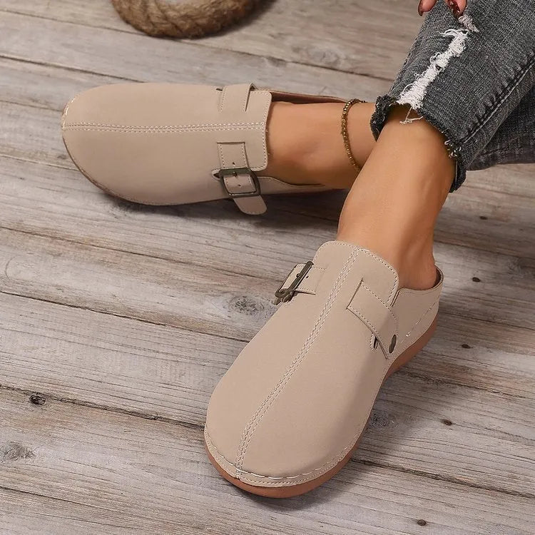 Women's casual wedge slipper in light brown with cloth upper and rubber sole