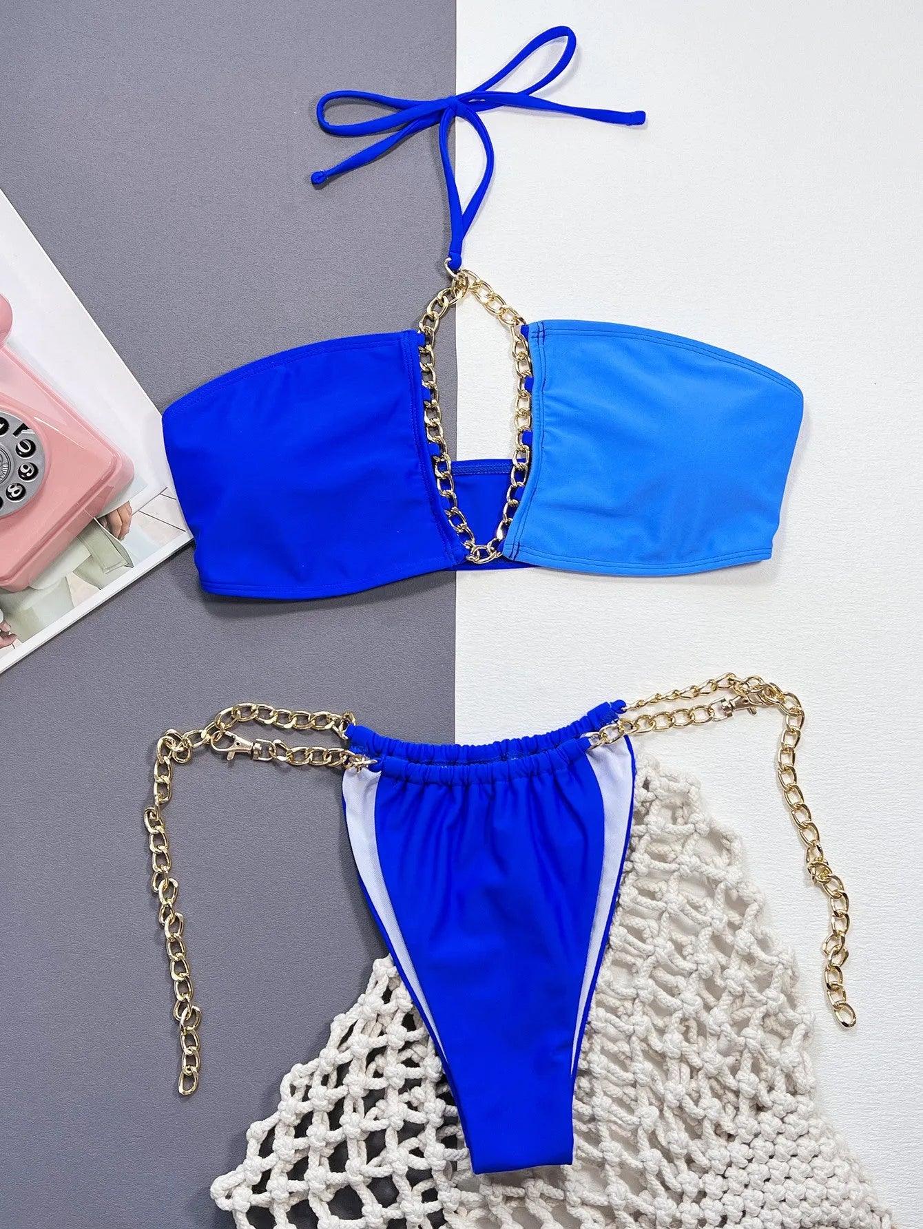 Solid blue women's nylon bikini swimsuit on a white background