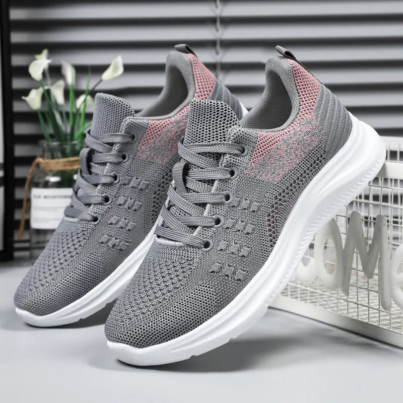 Women's black mesh casual sneakers with lace-up front and round toe