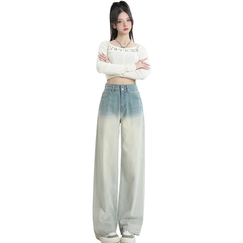 Women's gradient blue straight-leg denim trousers with wide leg silhouette on hanger