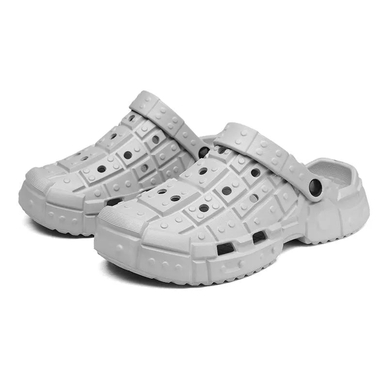 Men's black EVA slippers with thick sole, non-slip tread, and toe separator design on a white background.