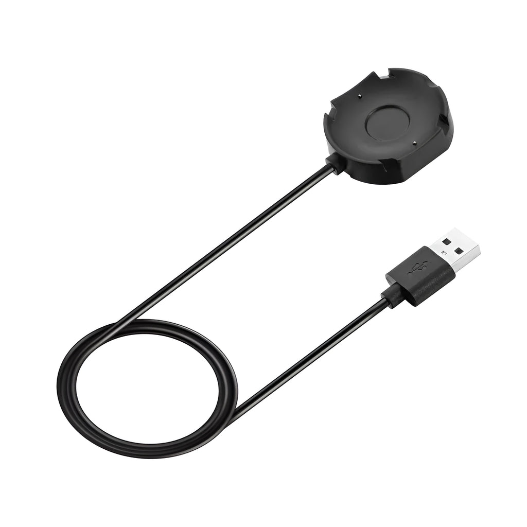 Black Withings Hybrid Smart Watch charging cable with magnetic probe on a desk