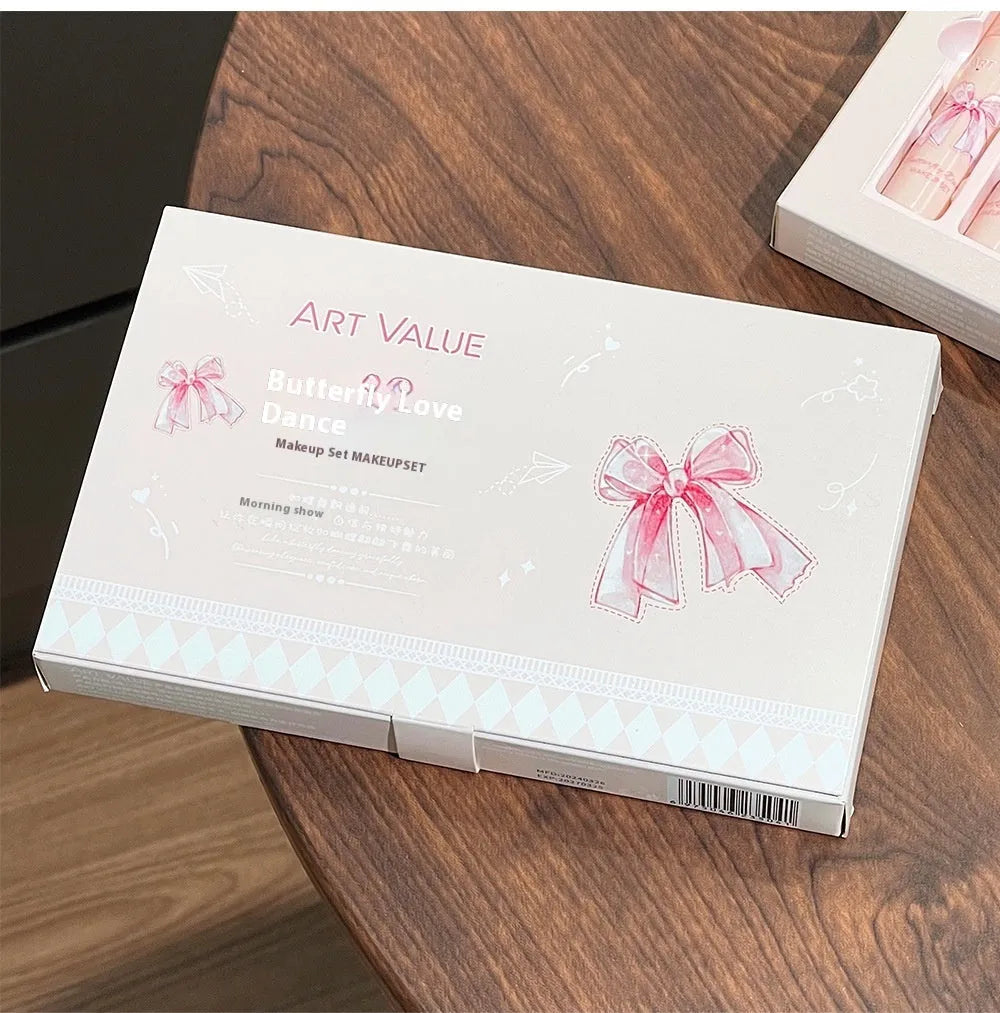 Butterfly Box makeup set with four pink matte lip muds, powder blusher, and matching necklace