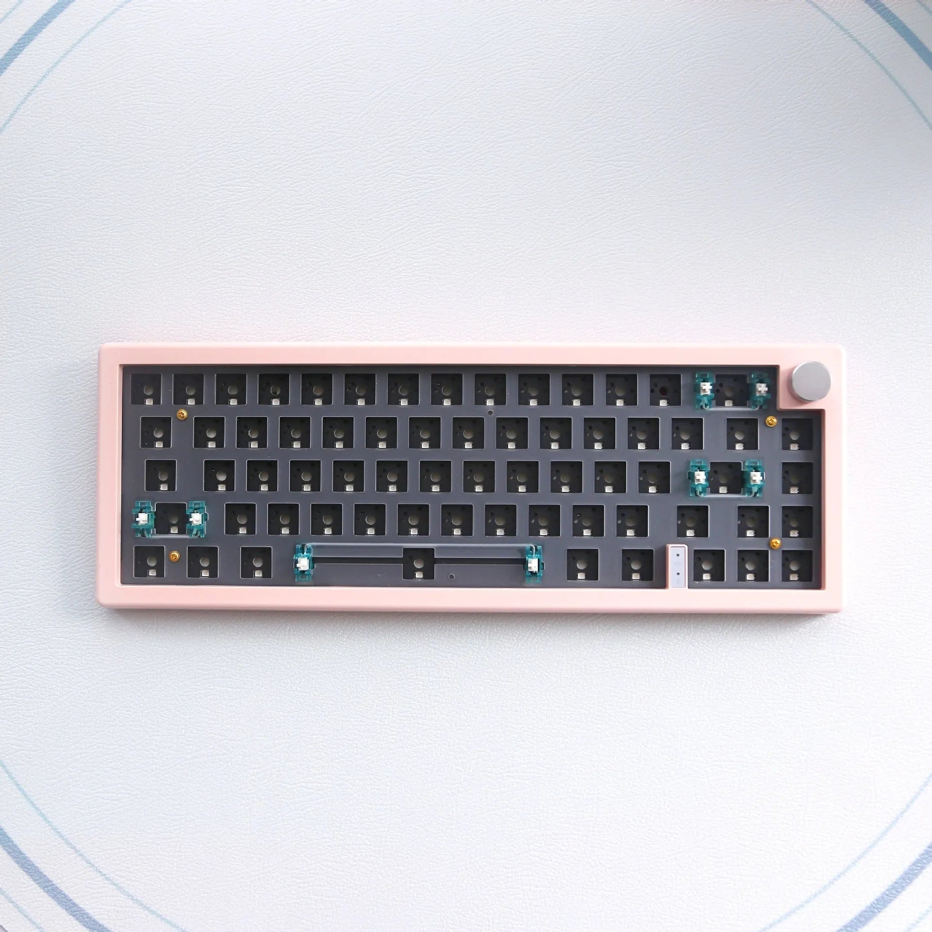 DIY mechanical keyboard kit with RGB backlighting, knob control, and seven colour options