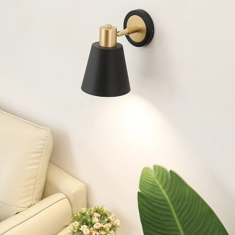 Nordic style iron wall lamp with tricolor LED light for bedside or living room.