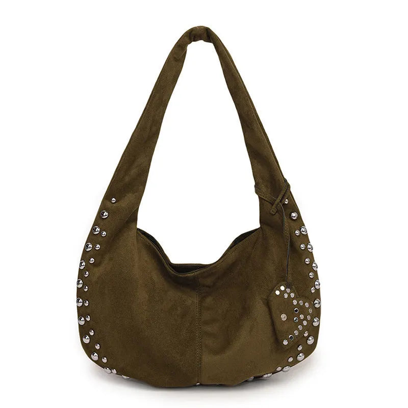 Strapless soft plush underarm tote handbag in a retro style, shown in one of its colour options.