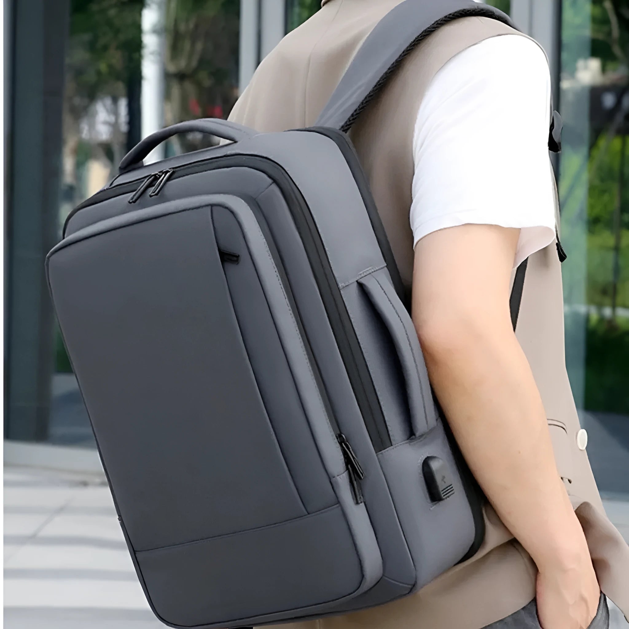 Men's black waterproof Oxford cloth backpack with curved shoulder straps showing business design