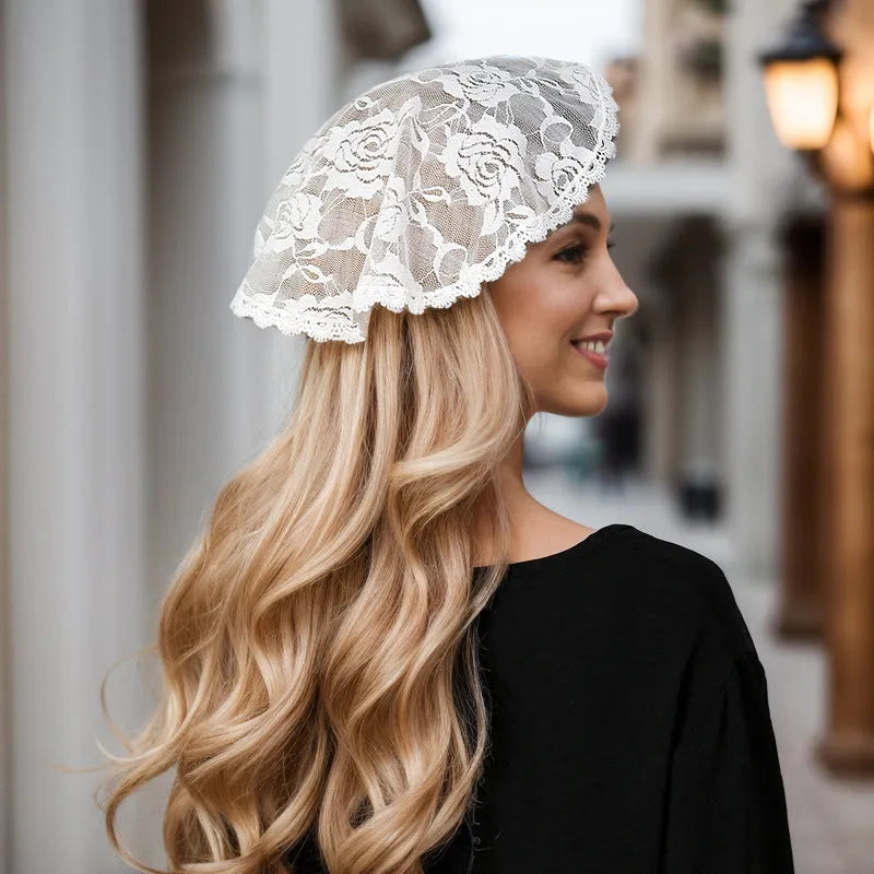 Round white bridal head cover with floral decoration measuring 30cm diameter