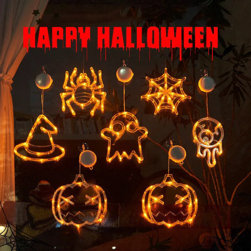 Seven Halloween LED window lights with spider, pumpkin and ghost designs on suction cups