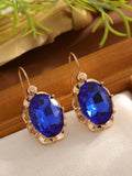 Pair of diamond studded earrings in polished zinc alloy, available in light blue, rose red, and royal blue colours