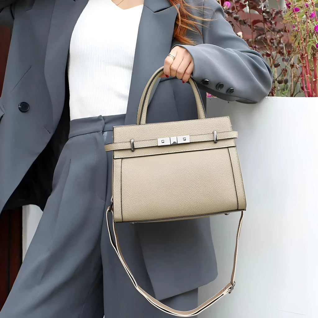 Genuine leather small square shoulder bag in almond green colour showing internal compartments