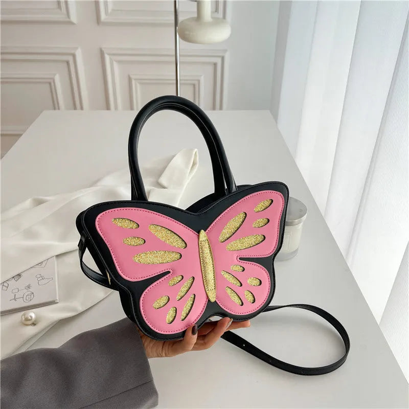 White square women's crossbody bag made of PU leather with contrast colour trim on a table.