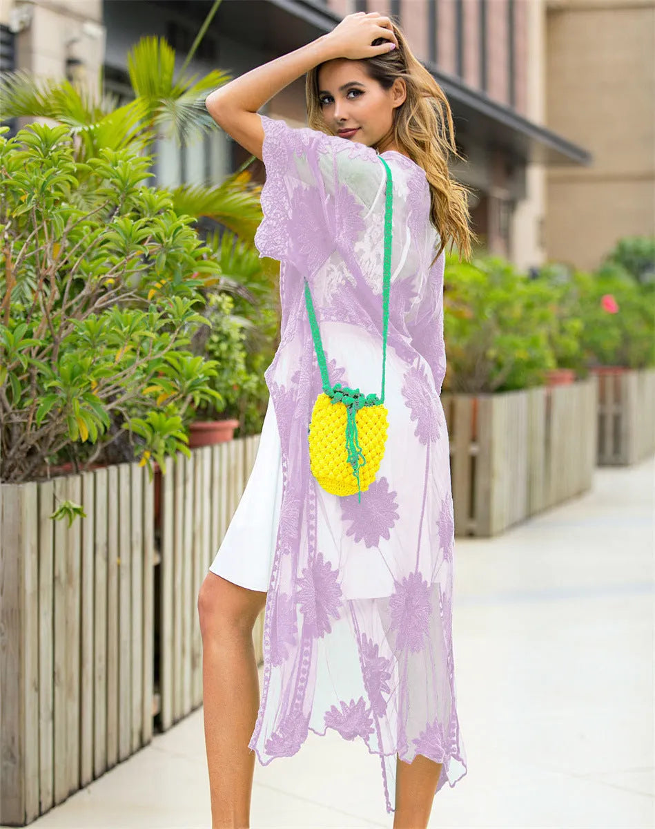 Light purple cotton women's beach dress with lace embroidery detail.