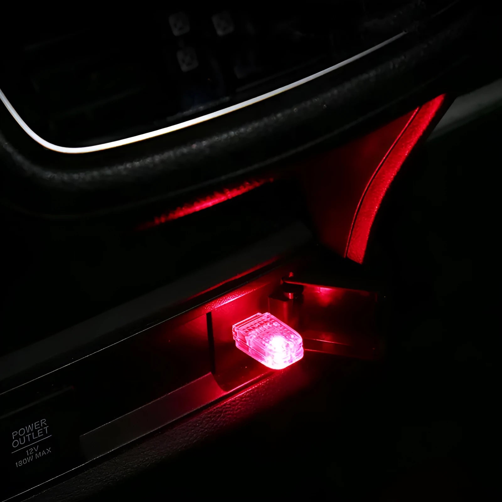 Multi-function car USB atmosphere light with touch switch and RGB voice control on a car dashboard