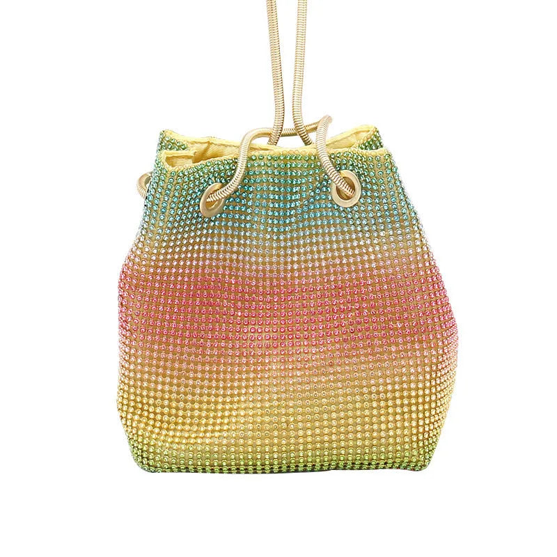 Colourful rainbow design rhinestone bucket bag with a soft fabric texture and a handle.