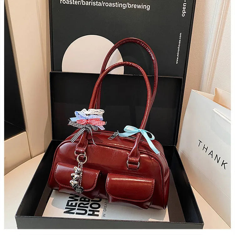 PU leather pillow-shaped flap handbag with double shoulder straps in retro one-shoulder design