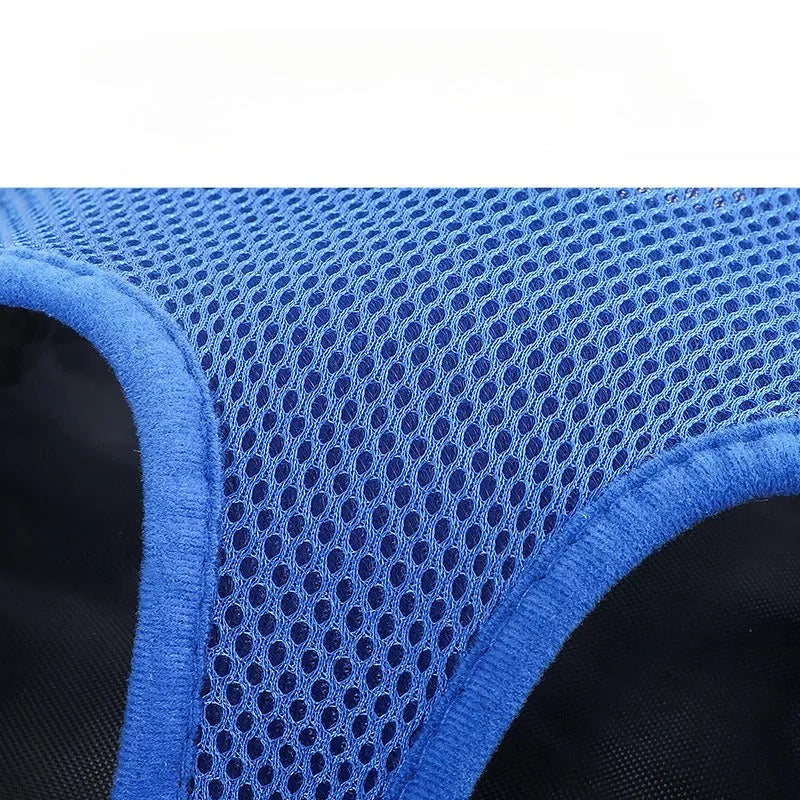 Convertible dog carrier backpack worn on front with small dog inside, showing adjustable straps and breathable mesh panels
