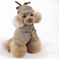 Camel-colour cotton detective cloak pet costume with adjustable hat on a small dog