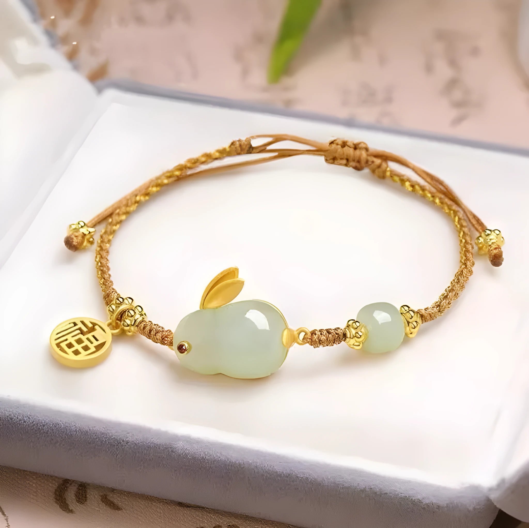 Hetian jade geometric rabbit charm bracelet on a yellow string for women