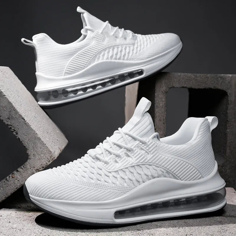 Men's black mesh running shoes with platform sole and lace-up closure