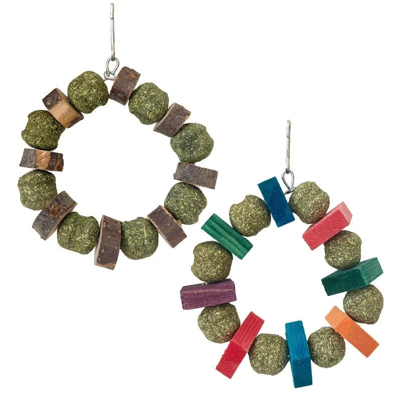 Hamster chew toy with colourful straw balls on ring and applewood molar rod