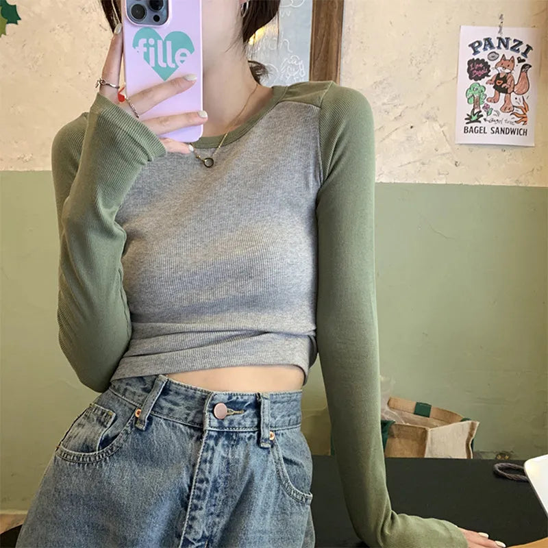 Women's oversized long sleeve top in dark blue black or green with princess sleeves and embroidery details