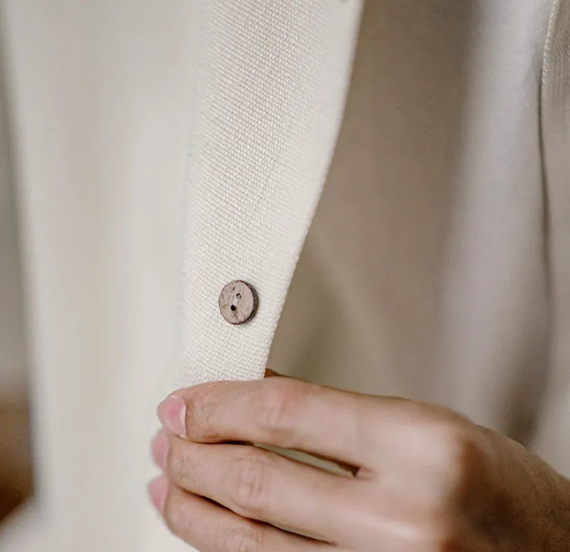Light apricot men's short sleeve shirt with a bamboo floral pattern and a Cuban collar.